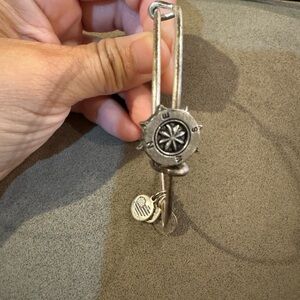 Alex and Ani bangle with compass charm slider